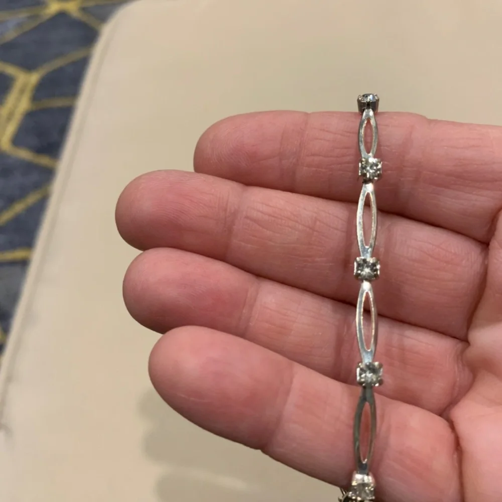 Silvertone Bracelet w/ Small Rhinestones Separated by Oval Shapes  Excellent